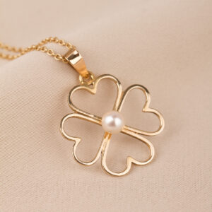 Berlock i form av en fyrklöver